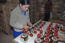 ceramic logo is applied to bottles of 1921 tequila at agabe tequilana 