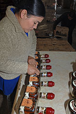 ceramic logo is applied to bottles of 1921 tequila at agabe tequilana 