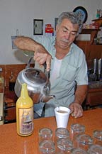 fidencio anaya prepares coffee extract with rompope