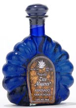 tres mujeres reposado tequila with metal label