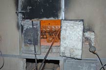 blown glass bottles are placed in an oven to cure