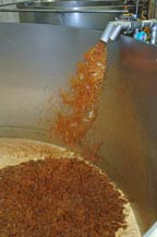 agave mosto is pumped into stainless steel fermentation tanks