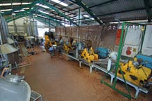 crushed agave is processed at tequila quiote - atotonilco el alto, jalisco