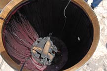 A French white oak barrel, is charred at Tres Mujeres Tequila