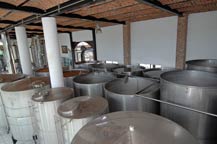 Fermentation and finished product storage tanks at Tres Mujeres Tequila. April 2010 